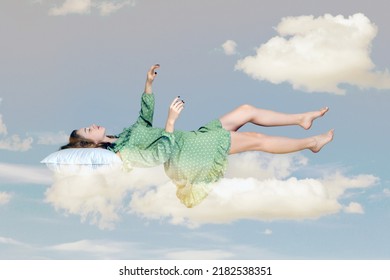 Sleeping Beauty Floating In Air. Relaxed Girl In Vintage Ruffle Dress Keeping Eye Closed, Lying On Pillow Levitating, Flying In Dream With Hands Up To Catch. Collage Composition On Day Cloudy Blue Sky