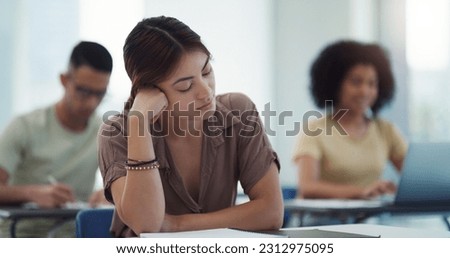 Sleeping, burnout and girl college student in a classroom bored, adhd or daydreaming during lecture. Tired, fatigue and female learner distracted in class, insomnia, boring or exam and quiz stress