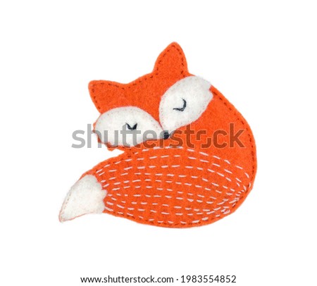 Sleeping fox toy isolate on white background