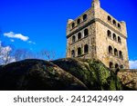 Sleeping Giant Observation Tower over the mossy rocks at the top of Mt. Carmel in Hamden, Connecticut, USA, built in the 1930s as part of the New Deal Project