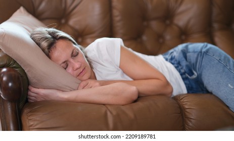 Sleeping Lazy Woman Lies On Couch During Day. Daytime Sleep And Rest