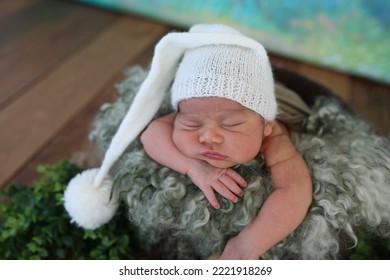 Sleeping Newborn Baby In A Basket. Newborn Winter Concept.