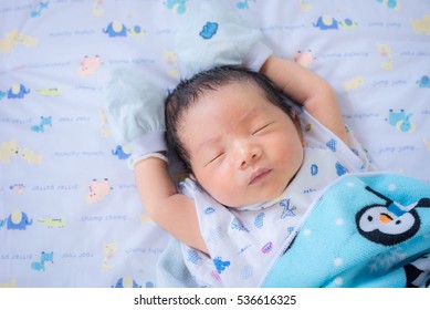 Sleeping Newborn Baby Boy Asian