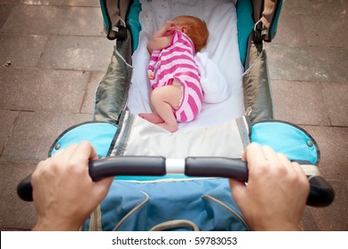 Sleeping Newborn Baby In The Pram