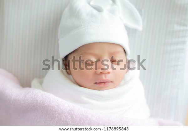 white newborn hat