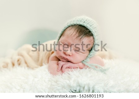 Similar – Baby girl with pompom hat sleeping