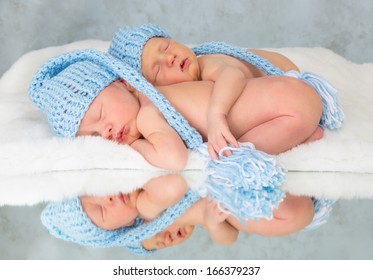 Sleeping Twins Reflected In A Mirror Like Quadruplets