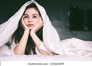 Sleepless Asian Woman Lying Down On Bed Tired From Insomnia 