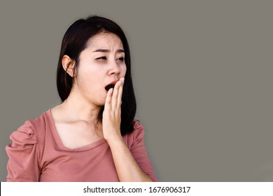 Sleepless Asian Woman Yawning And Tired From Insomnia With Dark Eyes Circle 