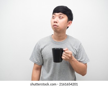 Sleepless Man Holding Coffee Cup Looking Up,Man Wake Up At Morning Feel Sleepy