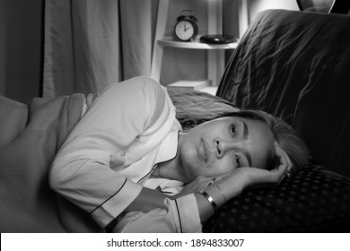 Sleepless Night. Insomnia Problem. Tired Woman Disturbed With Anxiety Trying To Rest In Bed.  Sleep Disorder Concept