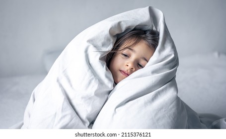 Sleepy Little Girl Wrapped White Blanket Stock Photo 2115376121 ...