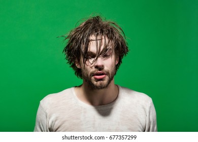 Sleepy Man With Wet Head, Face And Long Hair Refreshing In Morning In Underwear On Green Background, Wake Up