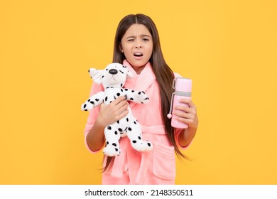 Sleepy Teen Girl In Home Terry Bathrobe With Toy And Thermos Bottle, Good Night