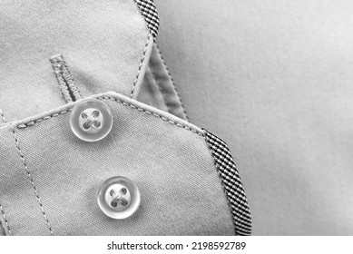 The Sleeve Of A Men's Shirt With Buttons Close-up. Black And White Photography