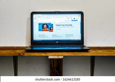 Sleman, Yogyakarta / Indonesia - January 23, 2020: Laptops with the WIX Website show this month as a trusted Developer website. WIX is an application for making personal and industrial scale websites 