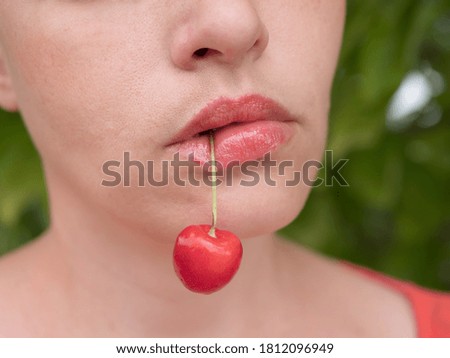 Similar – Image, Stock Photo Young girl picking cherries in the garden