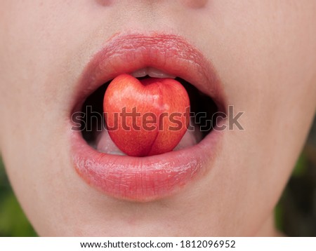 Similar – Image, Stock Photo Young girl picking cherries in the garden