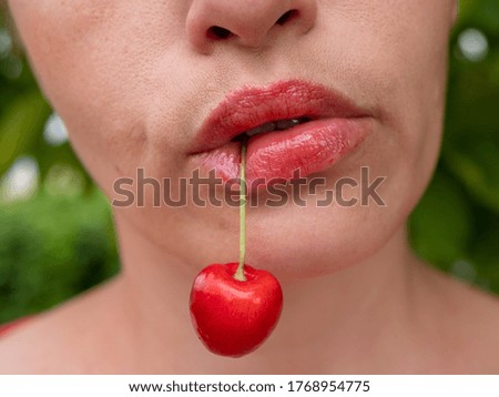 Similar – Image, Stock Photo Young girl picking cherries in the garden