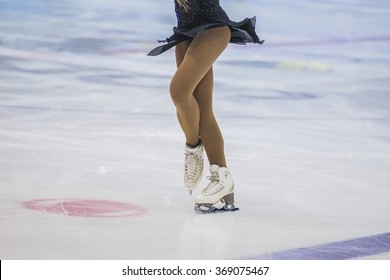 slender legs of girl skater. competitions in figure skating, performance of young athletes - Shutterstock ID 369075467