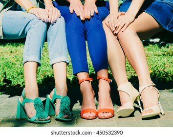 Slender legs in shoes with heels in summer