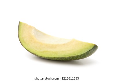 Slice of avocado isolated