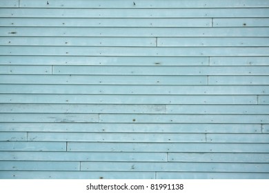 Slice The Blue Siding On Old House.