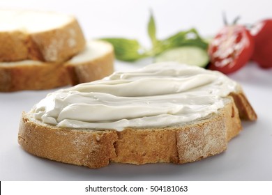 Slice Of Bread With Cream Cheese (selective Focus)