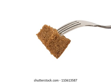 Slice of bread on a fork isolated