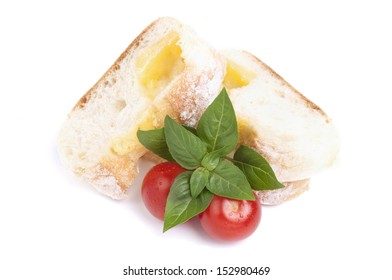 Slice bread with red tomato and basil