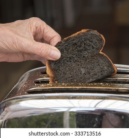 Slice Of Burnt Toast In A Toaster Machine