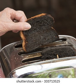 Slice Of Burnt Toast In A Toaster Machine