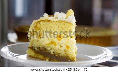 slice of cake with dulce de leche meringue and chaja peaches, typical dessert of Argentina and Uruguay