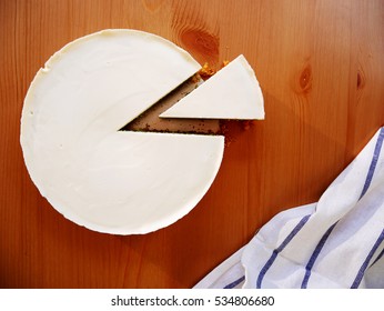 Slice Cheese Cake On The Wooden Table 