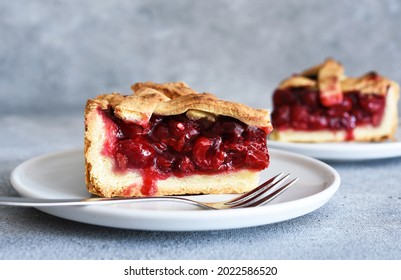 slice of cherry pie on the kitchen table. Fruit pie. Tart.