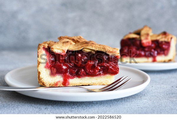 slice of cherry pie on the kitchen table. Fruit\
pie. Tart.