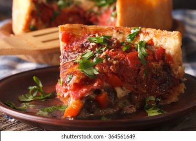 Slice Of Chicago Deep Dish Pizza Macro On A Plate On The Table. Horizontal
