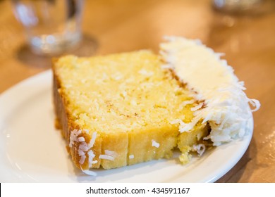 Slice Of Coconut Pound Cake On A Plate