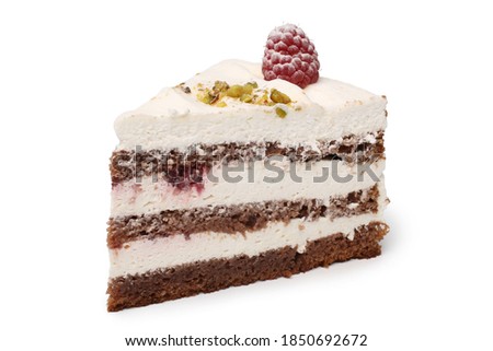 Slice of cream cake with fresh raspberry on white background