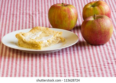 A Slice Of Fresh Apple Slab Pie On A White Plate