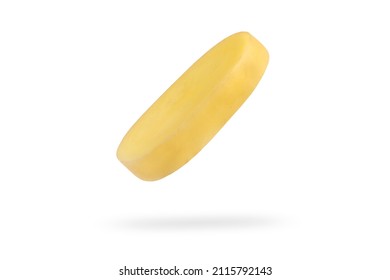 A slice of fresh unpeeled potatoes falls on a white background. Chopped raw potatoes. Food levitation concept. High resolution image
