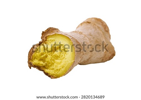 Slice Of Ginger Root From One End Highlighting Its Pungent Inside