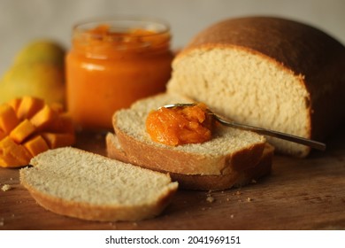 Slice Of Home Baked Wheat Bread With A Spread Of Home Made Alphonso Mango Jam. It Is A 3 Ingredient Jam With Mango Pulp, Sugar And Lime Juice. Alphonso Is The Tastiest Mango In India