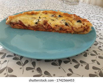 Slice Of Homemade Cast Iron Pizza