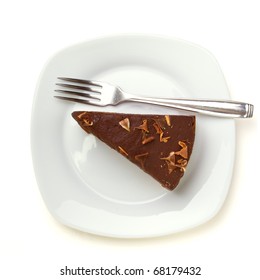 Slice Of Homemade Chocolate Cake Isolated On White Viewed From Above.