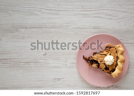 Similar – Image, Stock Photo Slice of pink brownie and traces of the whole cake