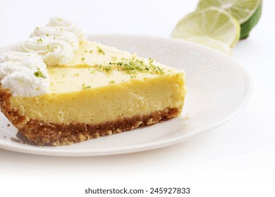 Slice Of Key Lime Pie On White Background