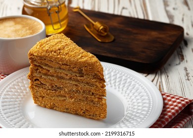 Slice Of Layered Honey Cake On Plate