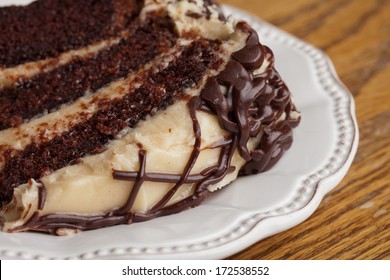 Slice Of Layered Whipped Peanut Butter And Chocolate Cake