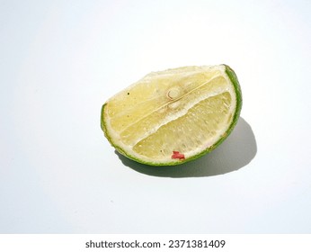 a slice of lime on a white background